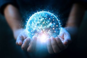digital globe in someone's hands