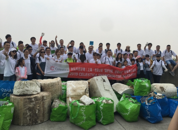 Celestica employees cleaning their local environment